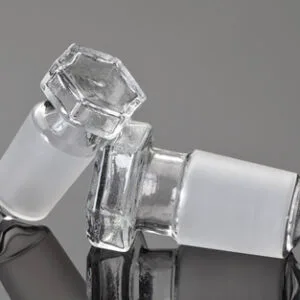 TAPON VIDRIO HUECO HEXAGONAL BASE PUNTA, P/ESM 24/29 Marca Endo Glassware.